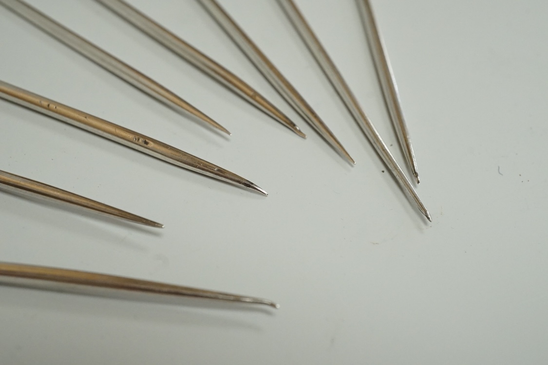 A set of eight Victorian silver game skewers?, with monogram terminals, Jane Brownett, London, 1877, 12,8cm.